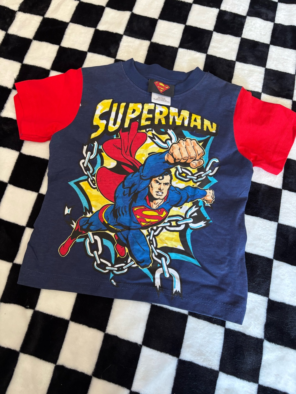 2T super man tshiet (small stain on logo)